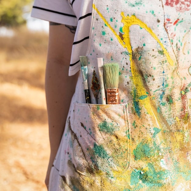 A close-up of a reusable water bottle and a bamboo toothbrush next to a map of Spain, symbolizing eco-friendly travel essentials.