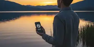 Digital Detox Challenge: A 7-Day Plan to Reclaim Your Focus in 2026 Person enjoying a sunset during a digital detox, phone disconnected